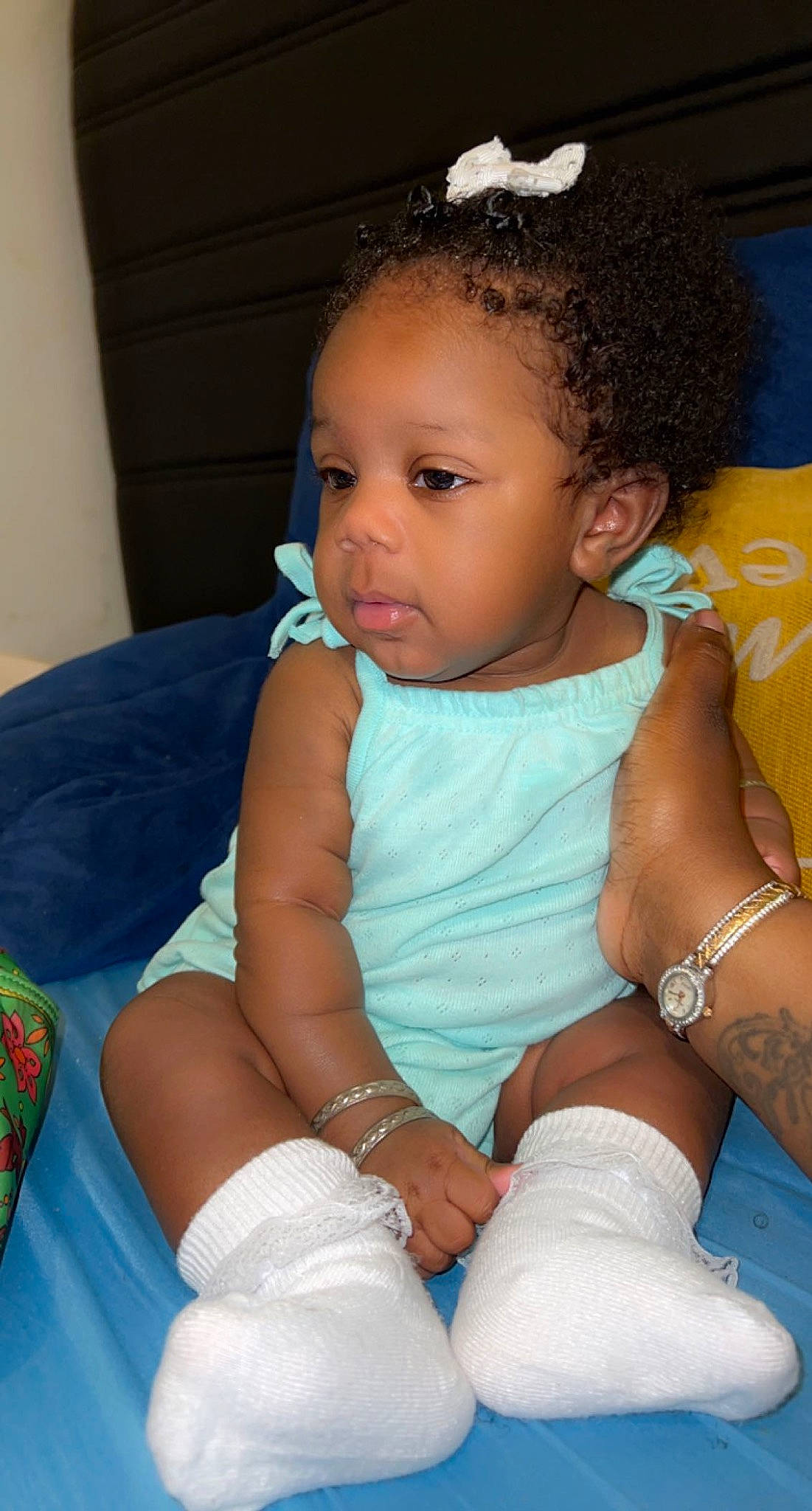 Ira is registered to the contest to win money with this photo: arm, baby, baby_toddler_clothing, cheek, comfort, eye, eyebrow, eyelash, face, finger, hair, hairstyle, happy, head, iris, lip, mouth, neck, nose, person