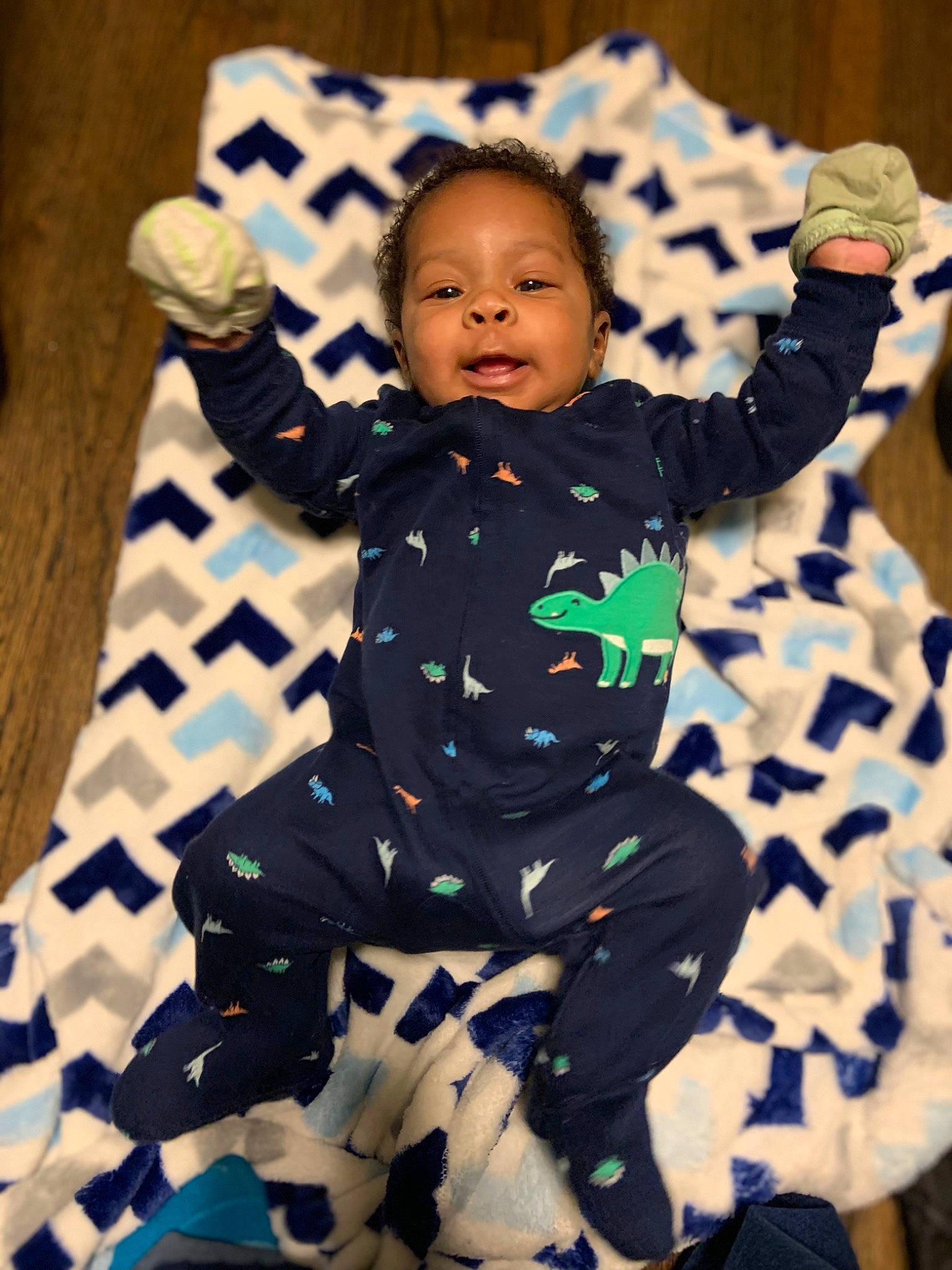 Deshawn is registered to the contest to win money with this photo: baby, baby_toddler_clothing, child, head, pattern, person, smile, textile, toddler
