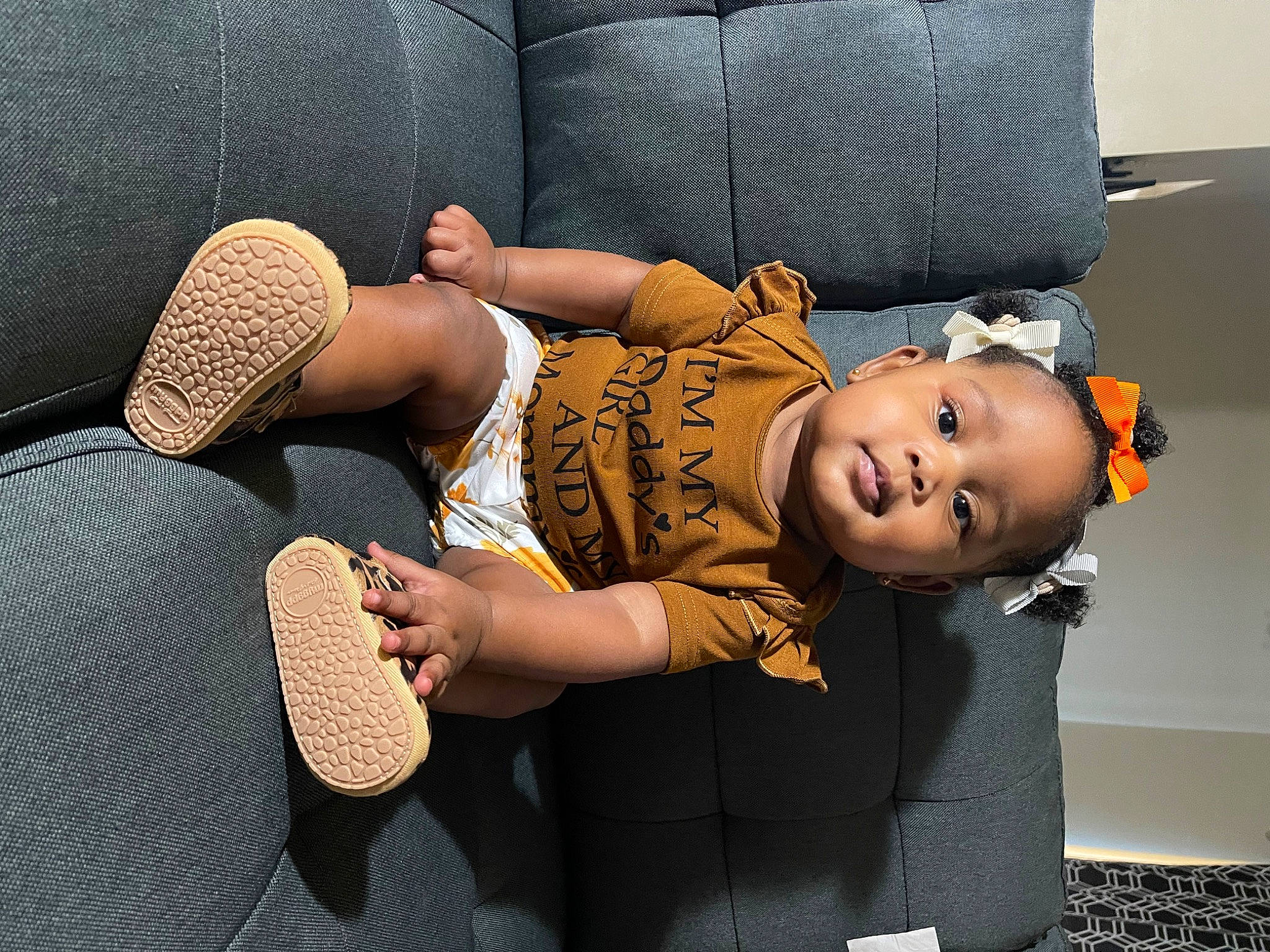 Wynter is registered to the contest to win money with this photo: arm, child, comfort, elbow, flash_photography, hairstyle, hand, hat, headgear, human_body, human_leg, joint, knee, leg, mouth, muscle, person, shoulder, thigh, trunk