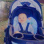 baby, stroller, graco, child, outdoor, pond, wooden_bridge, trees, nature, smiling, blue_eyes, baby_clothes, seat_belt, cushion, grass, daylight, park, infant, happy, portrait