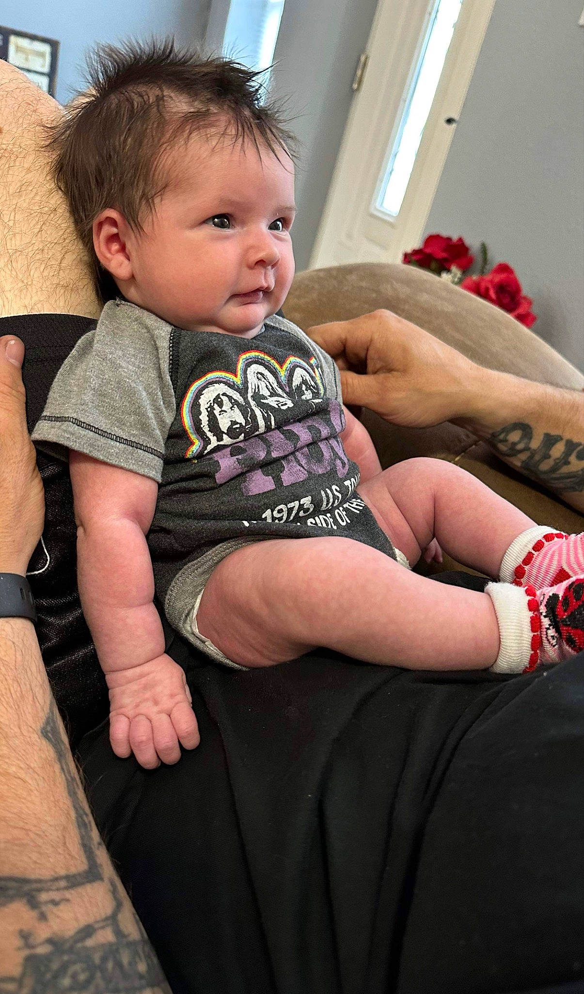 Rosalynn is registered to the contest to win money with this photo: arm, baby, baby_toddler_clothing, cheek, comfort, couch, face, facial_expression, finger, hand, happy, human_body, joint, leg, mouth, neck, person, shoulder, skin, sleeve