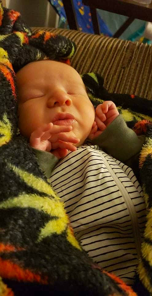 Bryson joined the competition — help win amazing prizes! baby, baby_sleeping, baby_toddler_clothing, cheek, child, comfort, eyelash, finger, knit_cap, linens, lip, mammal, nose, person, skin, textile, thumb, toddler, vertebrate, wool