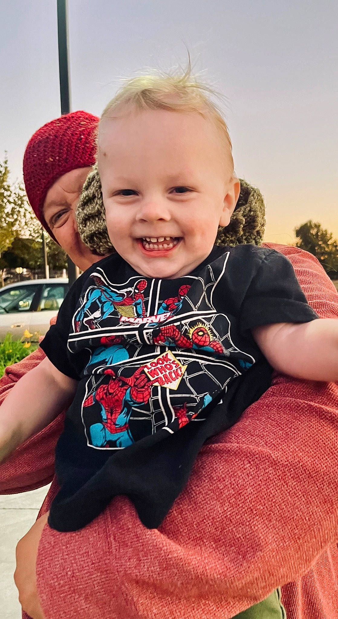 Josh is registered to the contest to win money with this photo: baby_toddler_clothing, cool, face, facial_expression, hairstyle, happy, head, iris, joy, lip, neck, person, pink, plant, shoulder, skin, sky, sleeve, smile, standing