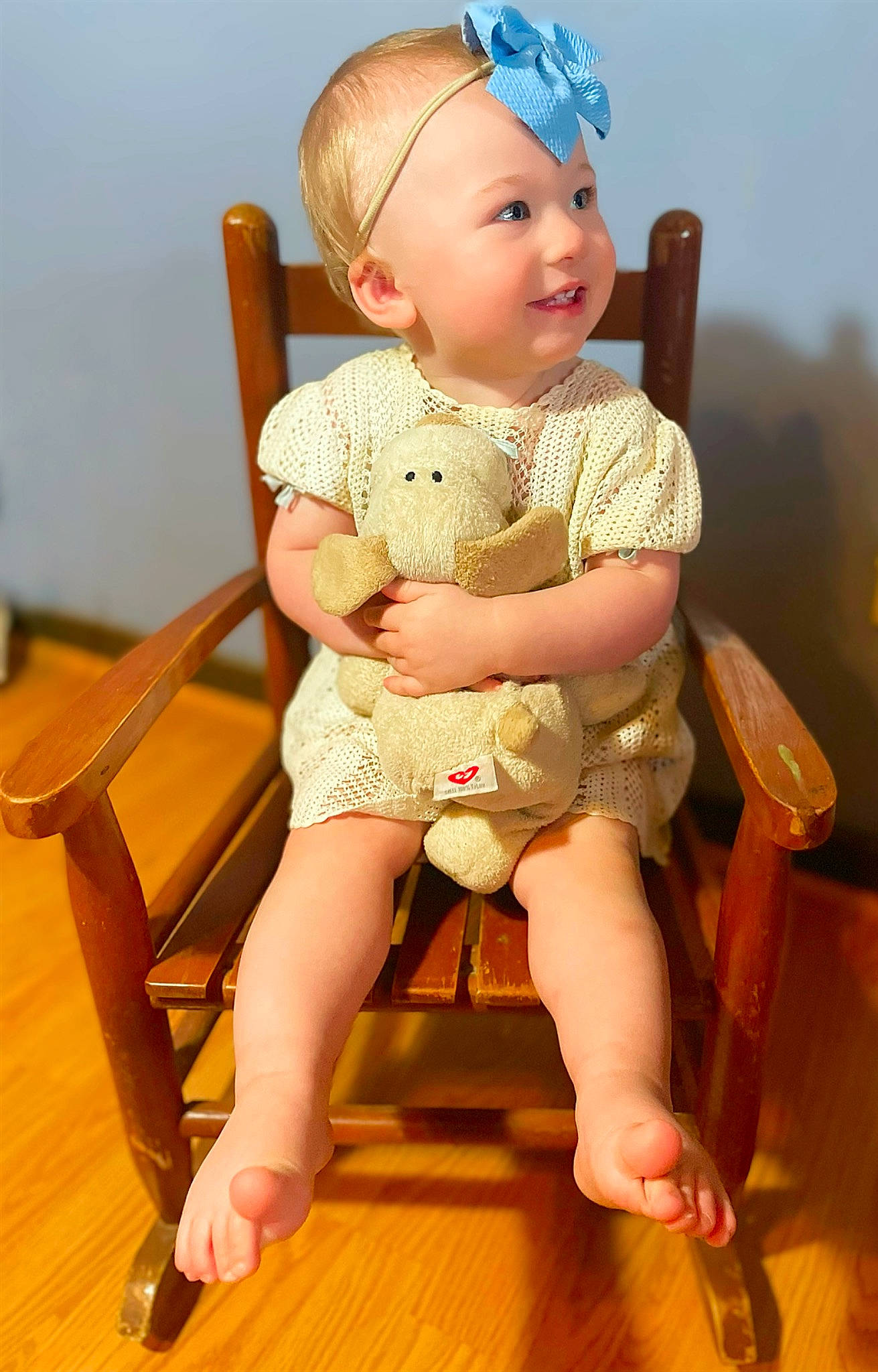 Charli joined the competition — help win amazing prizes! baby, baby_toddler_clothing, beauty, cap, chair, cheek, comfort, eye, face, flooring, fun, happy, hardwood, hat, headwear, human_leg, person, photograph, skin, thigh
