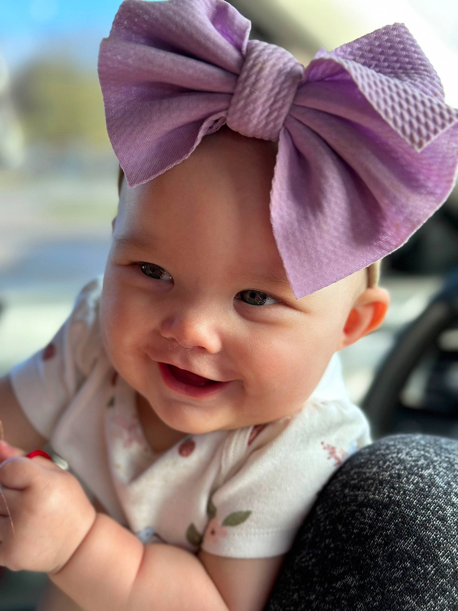 Temperance is registered to the contest to win money with this photo: baby, baby_toddler_clothing, cap, child, chin, cool, costume_hat, face, gesture, happy, hat, head, headgear, headwear, lip, person, photograph, pink, purple, skin