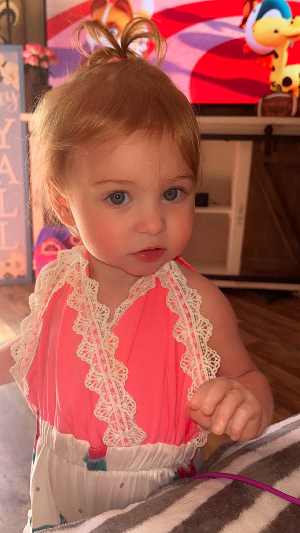 Paisley is registered to the contest to win money with this photo: baby, baby_toddler_clothing, blond, chair, cheek, child, chin, dress, event, fashion_accessory, fun, hairstyle, happy, iris, jewellery, kitchen_utensil, organ, person, pink, skin