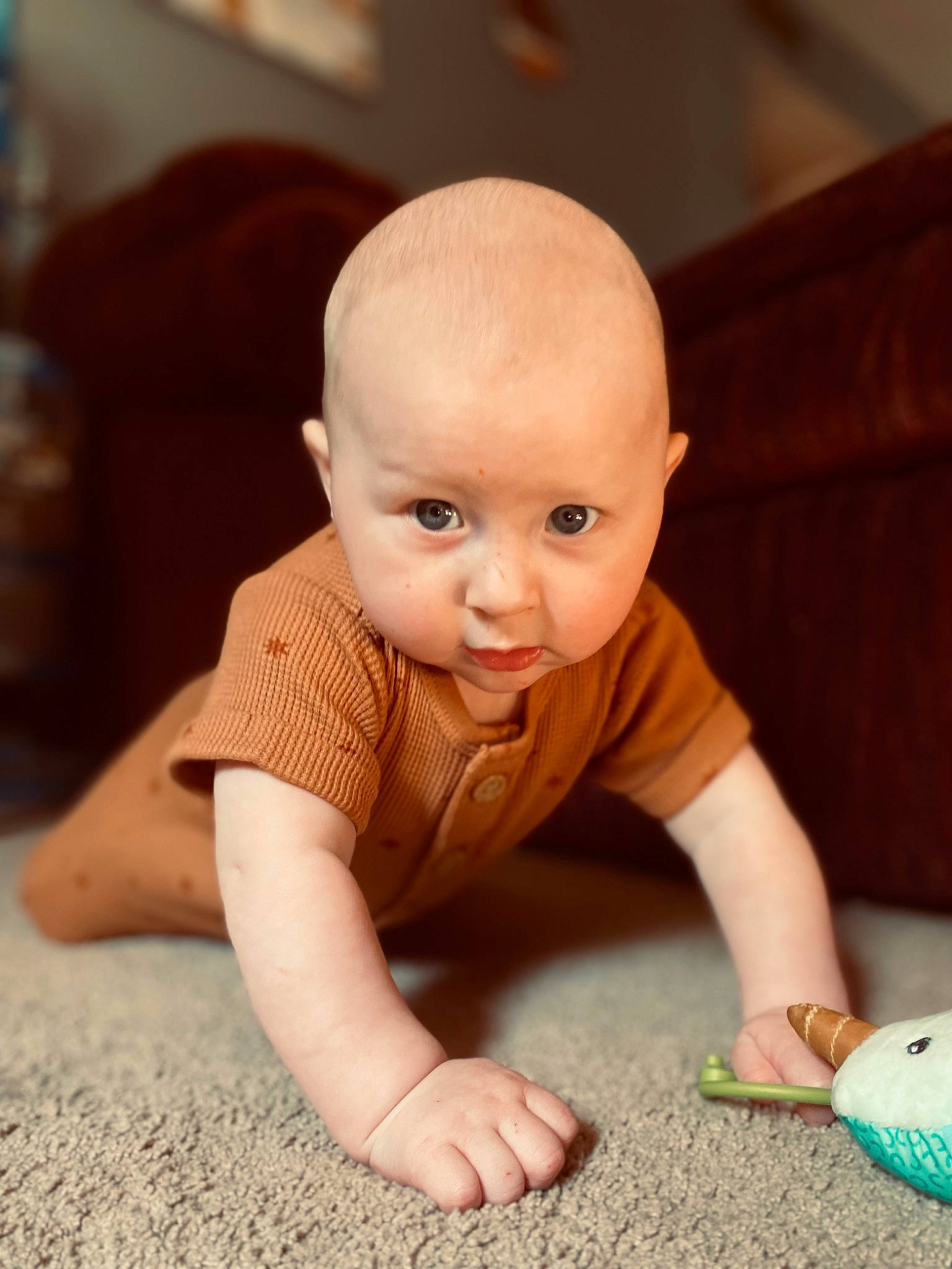 Axton joined the competition — help win amazing prizes! baby, baby_toddler_clothing, cheek, child, comfort, crawling, finger, floor, flooring, foot, fun, happy, hardwood, human_body, nose, person, sitting, skin, toddler, tummy_time