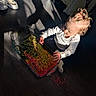 blanket, child, colorful, croc_shoes, curious, exploration, floor, flooring, glass_container, grains, hair, home, indoor, play, sensory_bin, shadow, sunlight, toddler, toy, white_clothing