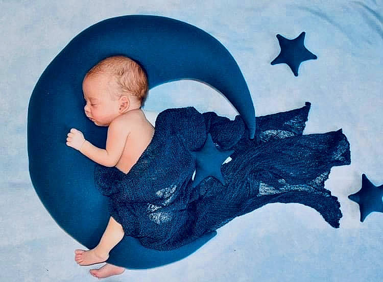 Chandler is registered to the contest to win money with this photo: aqua, azure, baby, baby_toddler_clothing, comfort, electric_blue, facial_expression, flash_photography, happy, leg, leisure, mammal, person, product, sleeve, t_shirt, textile, thigh, toddler, vertebrate