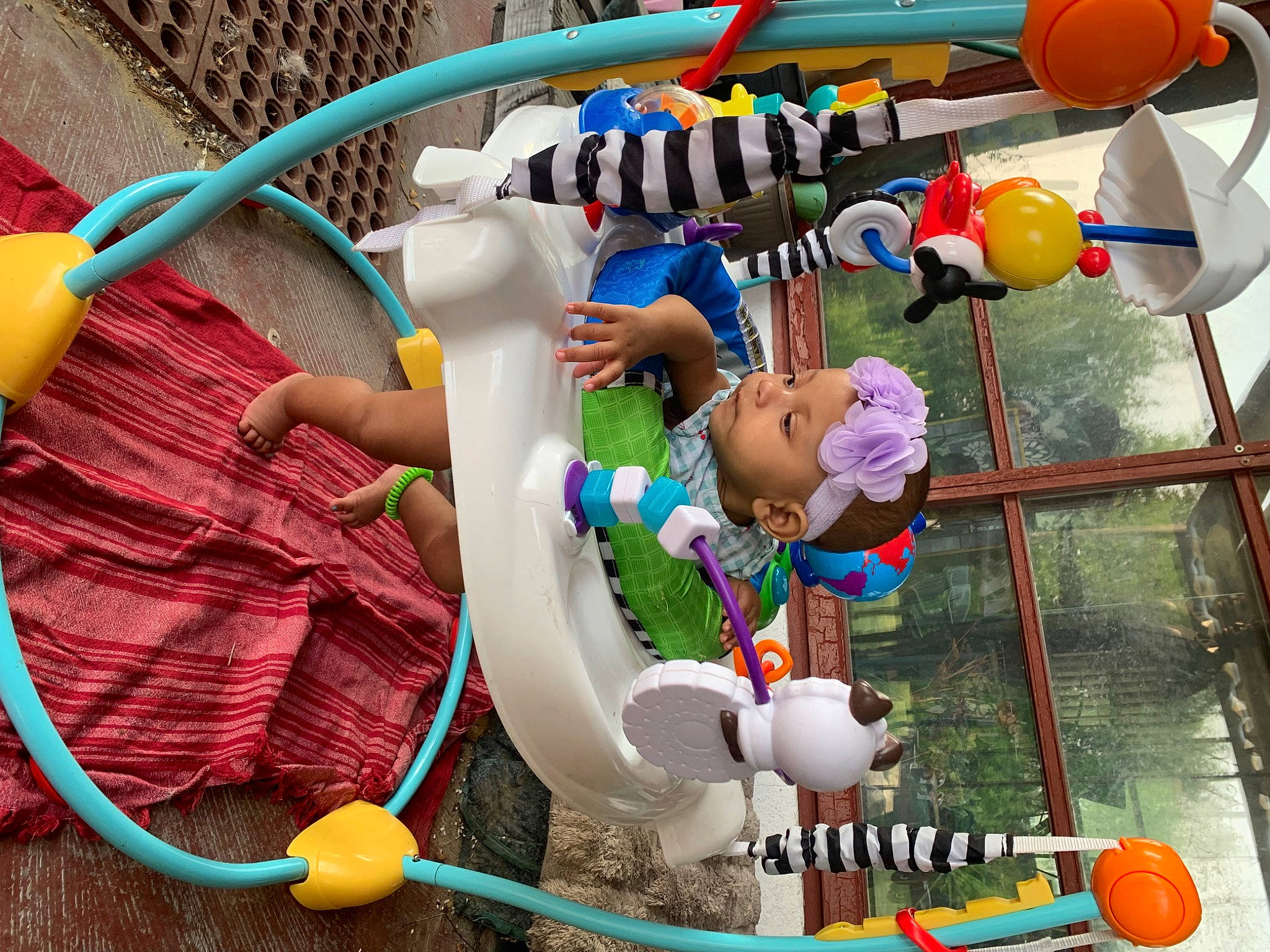 Deja joined the competition — help win amazing prizes! baby, balloon, child, event, fun, happy, hat, headwear, leisure, light, party, party_supply, person, plastic, play, recreation, summer, toddler, toy, vacation