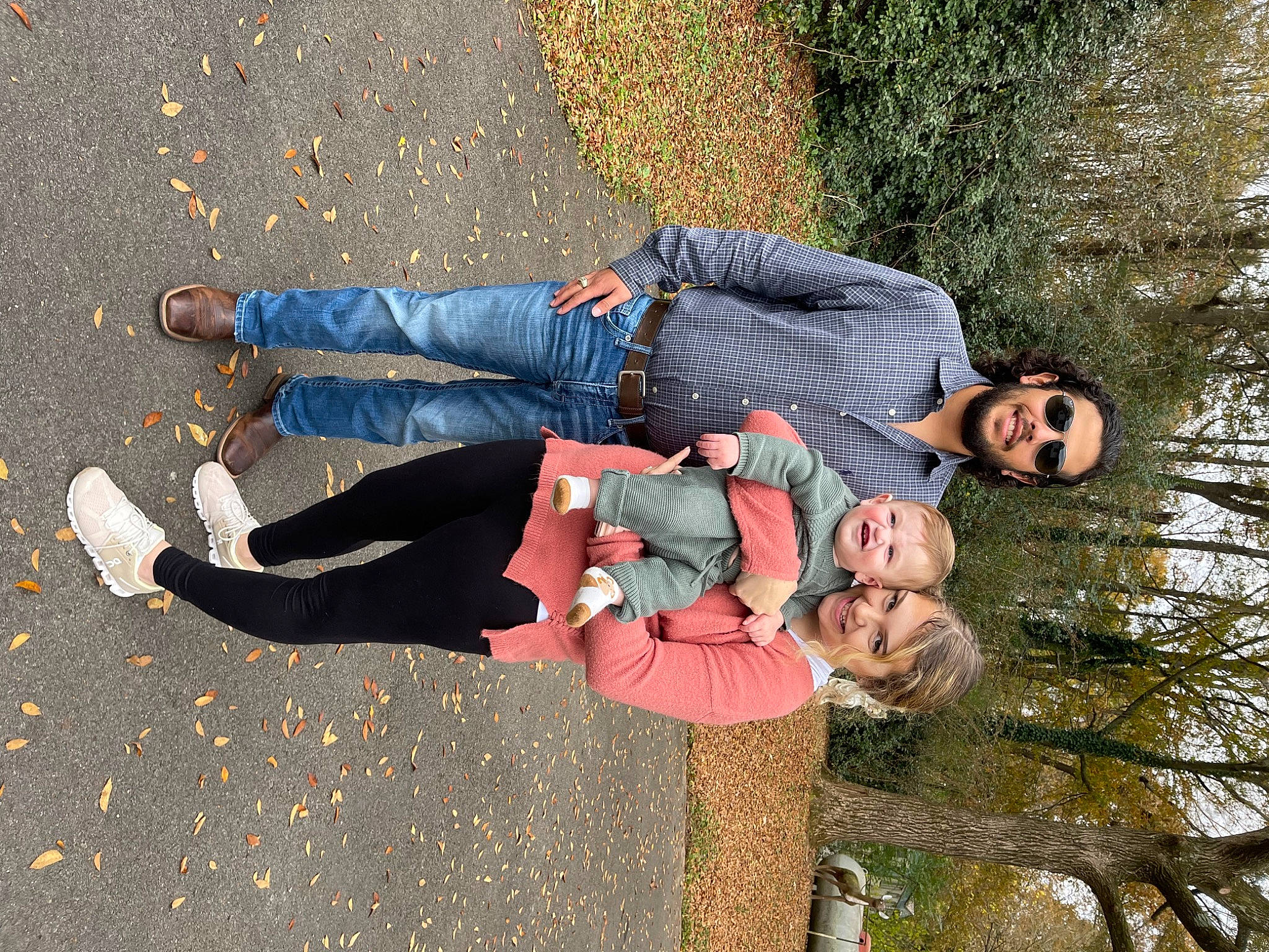 Junior is registered to the contest to win money with this photo: asphalt, electric_blue, fun, grass, happy, human_leg, joy, leaf, leg, leisure, people_in_nature, person, plant, recreation, road_surface, shoe, smile, spring, sunglasses, thigh