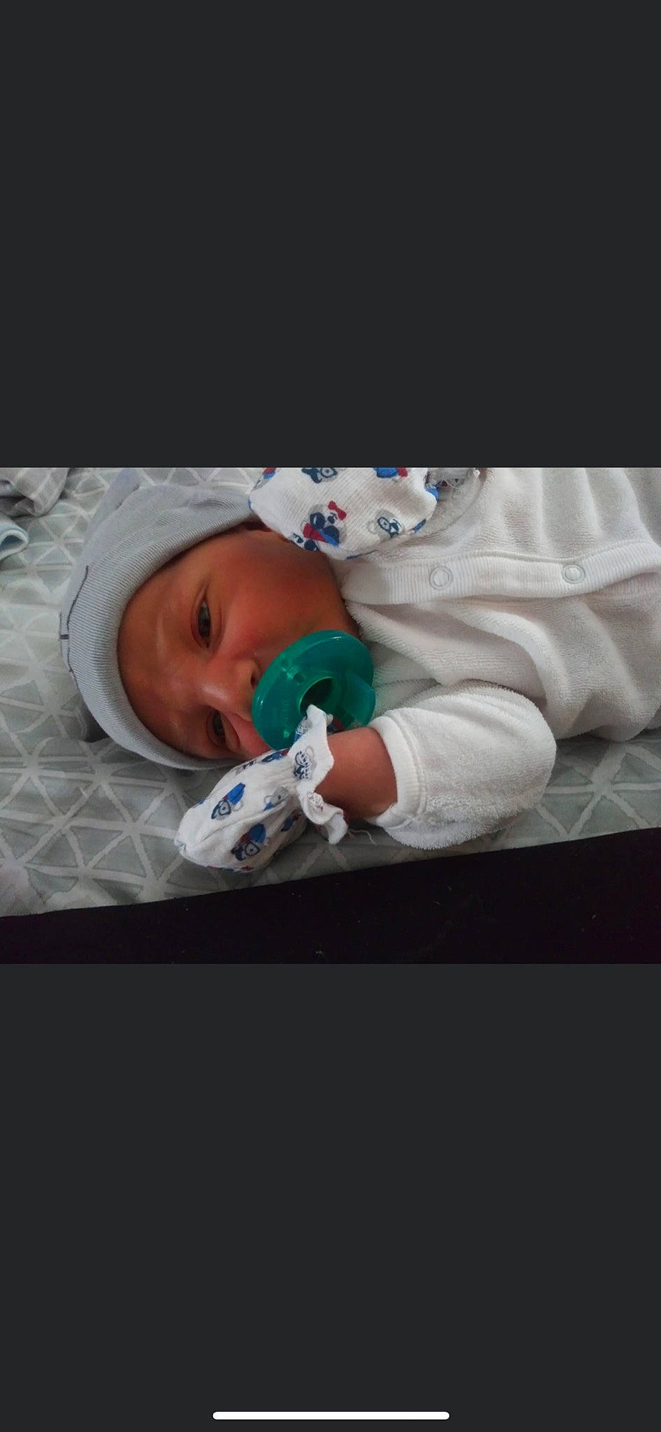 Junior is registered to the contest to win money with this photo: baby, baby_products, baby_safety, child, comfort, headwear, health_care, hospital, linens, medical, medical_equipment, person, room, service, sleeve, toddler