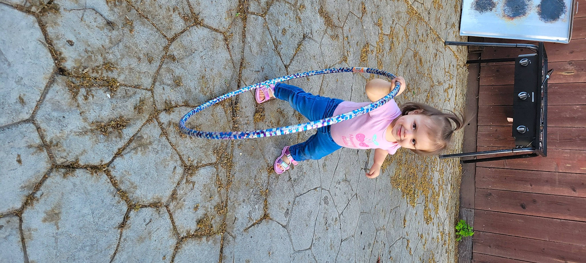 Daniella joined the competition — help win amazing prizes! baby_toddler_clothing, cement, child, concrete, electric_blue, fun, grass, happy, hula_hoop, joy, leisure, magenta, pattern, people_in_nature, person, play, recreation, rope, soil, t_shirt
