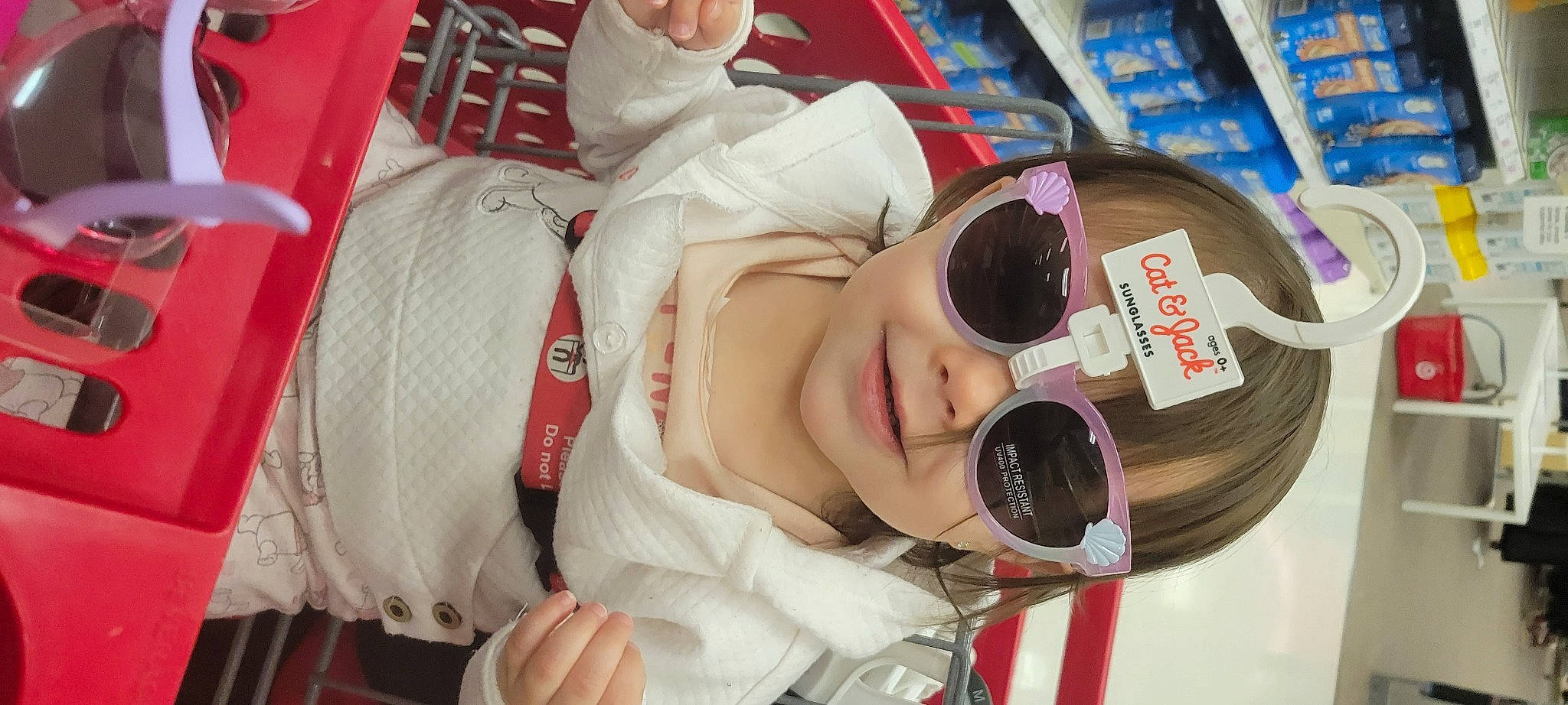 Daniella joined the competition — help win amazing prizes! arm, cheek, child, cool, eyelash, eyewear, facial_expression, glasses, goggles, hand, headgear, hearing, mouth, nail, person, publication, skin, sleeve, sunglasses, toddler