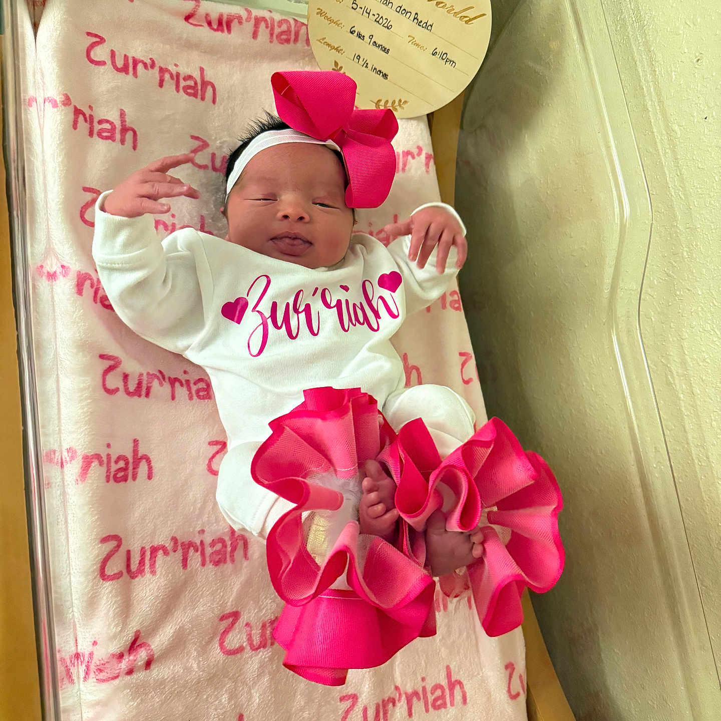 Zurriah is registered to the contest to win money with this photo: baby, baby_clothes, bassinet, blanket, bow, clothing, cute, feet, girl, headband, hospital, hospital_bed, infant, name, newborn, pink, portrait, sleeping, white, wooden_plaque