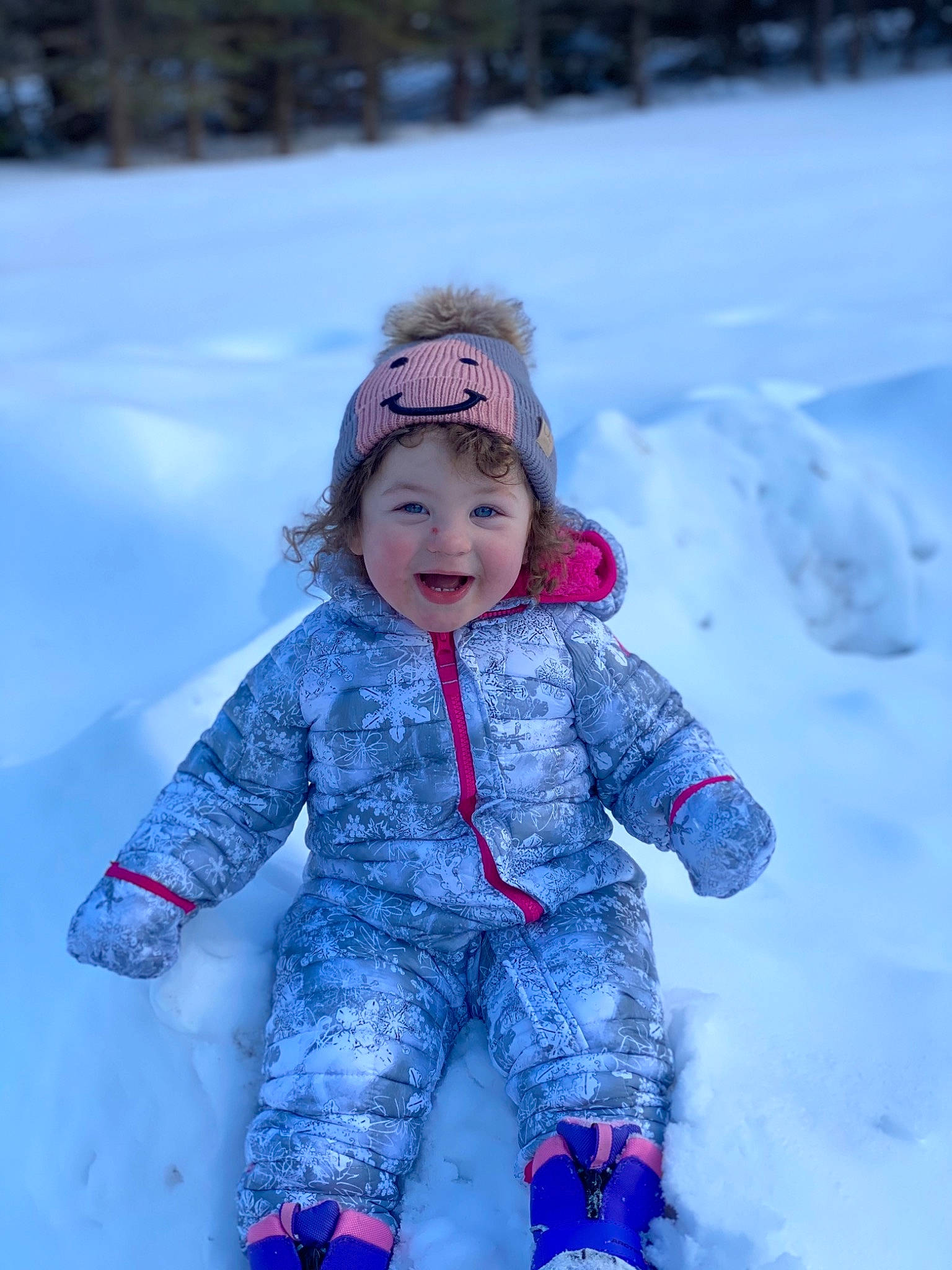 Raelynn joined the competition — help win amazing prizes! baby_toddler_clothing, child, electric_blue, freezing, fun, geological_phenomenon, happy, headwear, ice_cap, leisure, mammal, people_in_nature, person, photograph, playing_with_kids, purple, recreation, smile, snow, standing