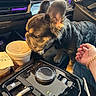 Mochi joined the competition — help win amazing prizes! french_bulldog, puppy, car_interior, drink_cup, center_console, dashboard, hand, bracelet, pet, vehicle, curious, black_fur, small_dog, car_controls, ambient_lighting, indoor, close_up, sniffing, seat, technology