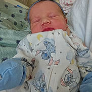 Barbara joined the competition — help win amazing prizes! newborn, baby, sleeping, onesie, headband, mittens, cartoon_print, indoor, bed, blanket, cute, infant, soft, cozy, child, person, sleep, young, apparel, rest