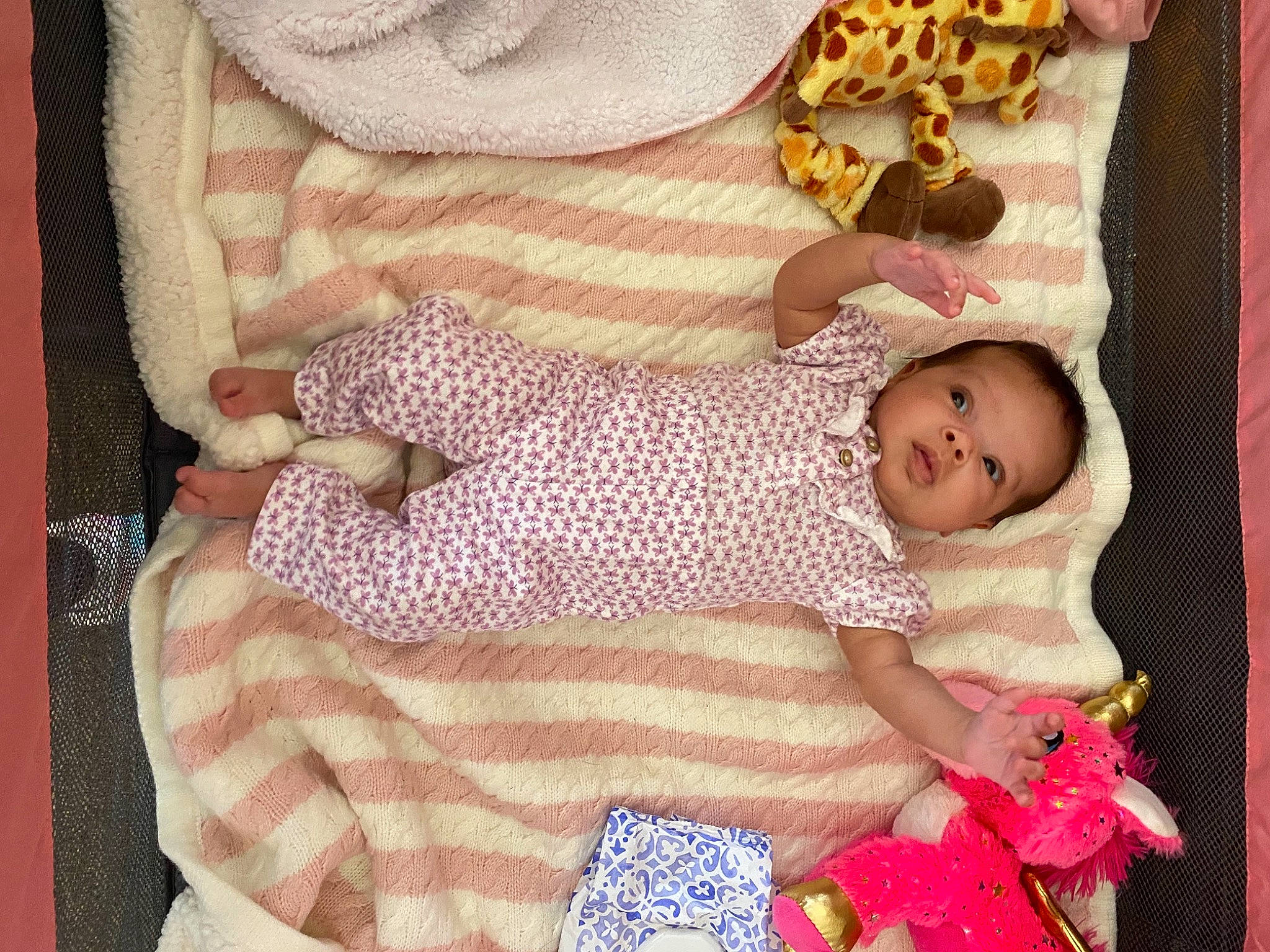 Cecelia joined the competition — help win amazing prizes! arm, baby, baby_products, baby_sleeping, baby_toddler_clothing, cheek, child, comfort, eye, hand, head, linens, magenta, pattern, person, pink, product, skin, sleeve, textile