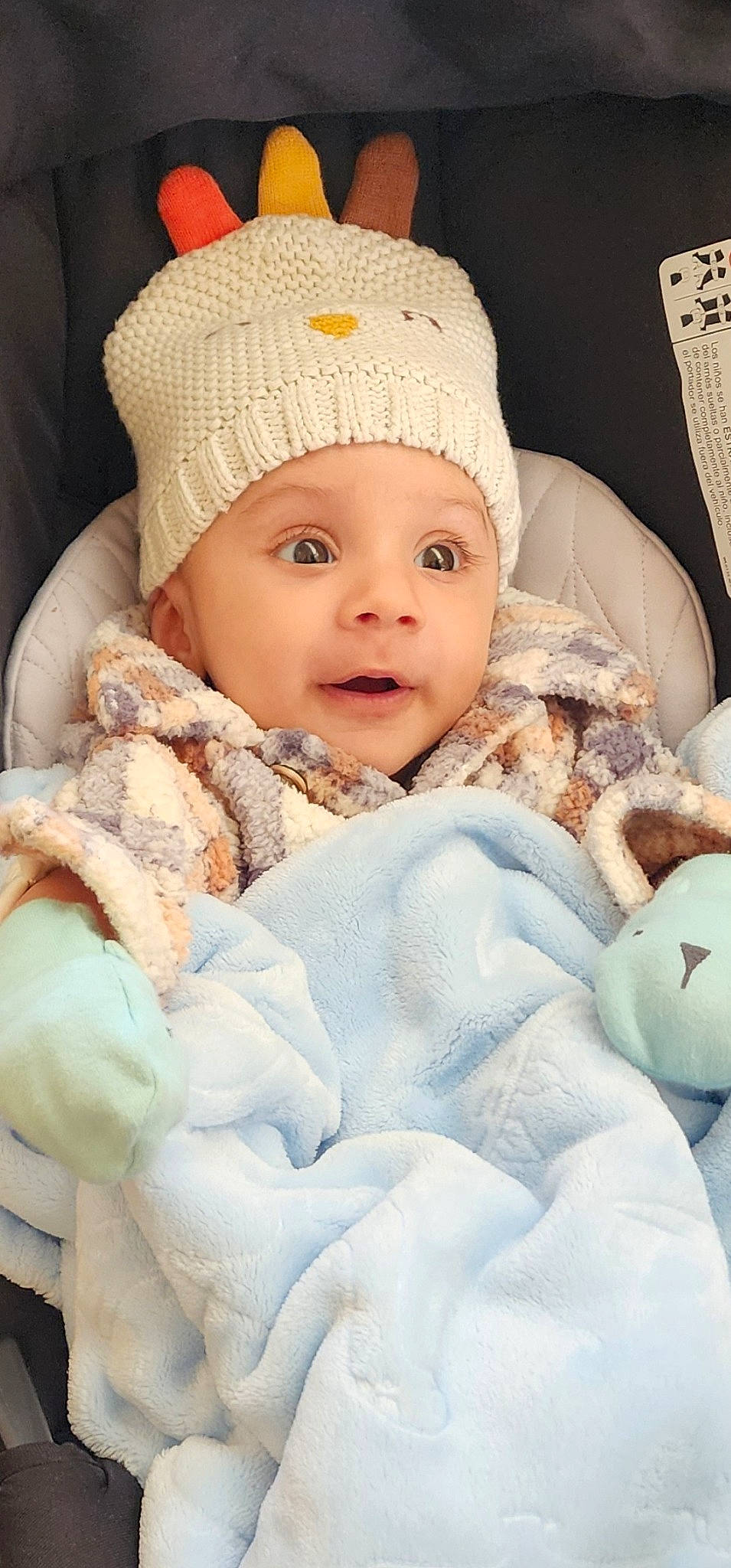 Taranjot is registered to the contest to win money with this photo: baby, baby_sleeping, baby_toddler_clothing, cap, cheek, clothing, comfort, eye, face, facial_expression, happy, head, headgear, headwear, iris, knit_cap, linens, person, skin, smile