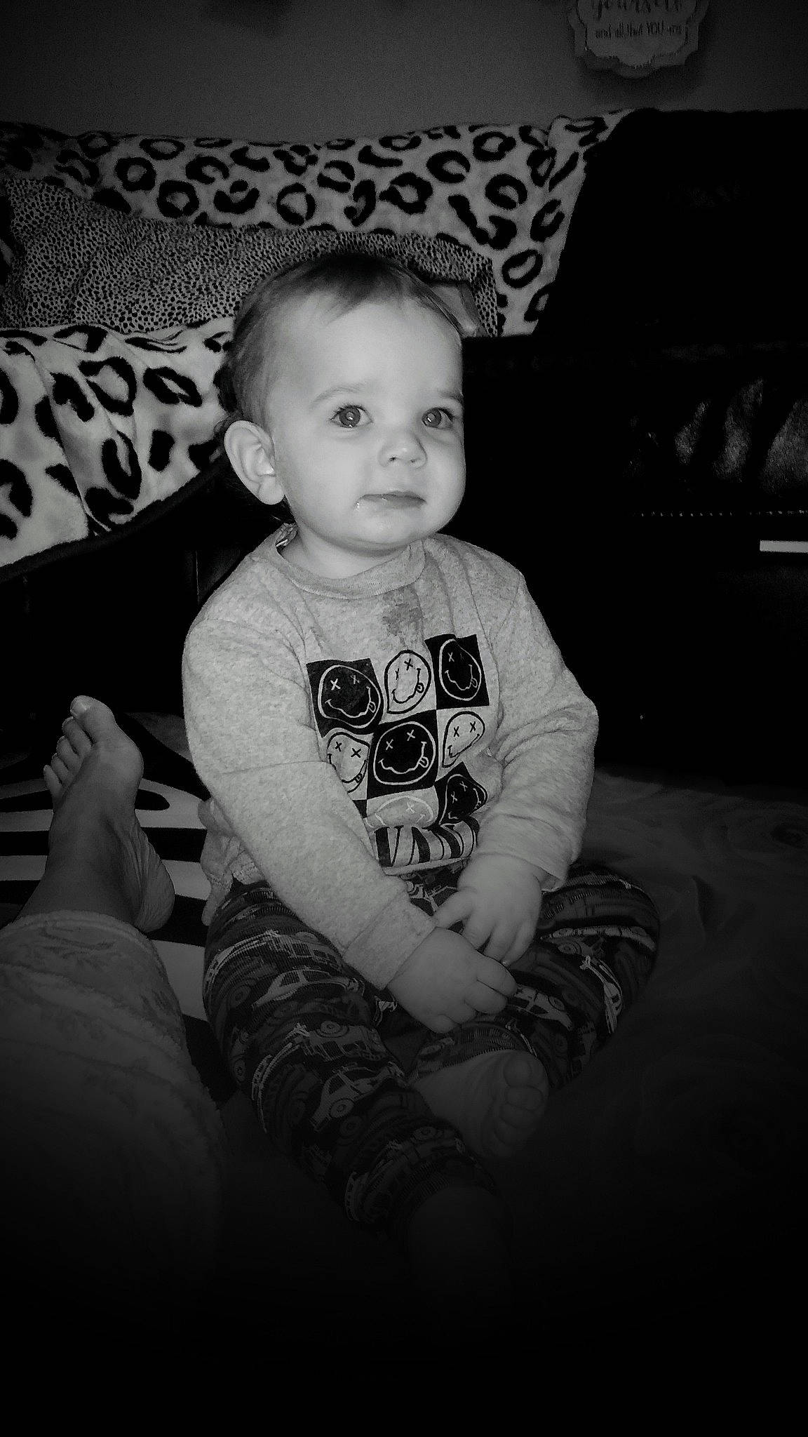 Bradley is registered to the contest to win money with this photo: baby, black, black_and_white, cheek, child, eye, face, head, monochrome, monochrome_photography, people, person, photograph, photography, room, sitting, skin, smile, snapshot, toddler