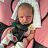Oaklynn joined the competition — help win amazing prizes! baby, blanket, car_seat, child, close_up, clothing, cozy, eyes, face, fists, harness, indoors, infant, newborn, pacifier, photography, pink, portrait, safety_strap, seated
