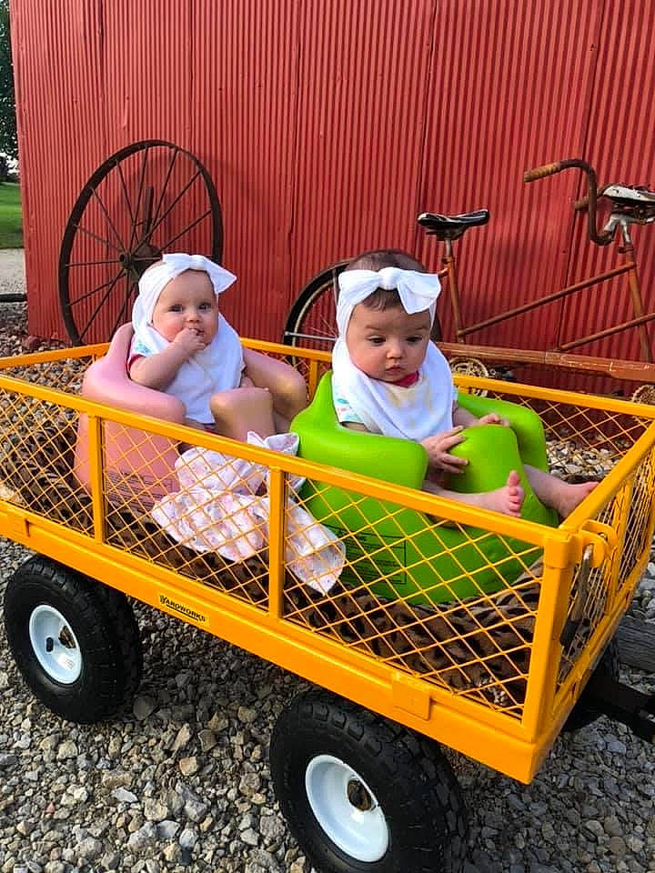 Ensley And Rylann is registered to the contest to win money with this photo: car, cart, child, fun, headwear, person, play, product, toddler, vehicle, wagon