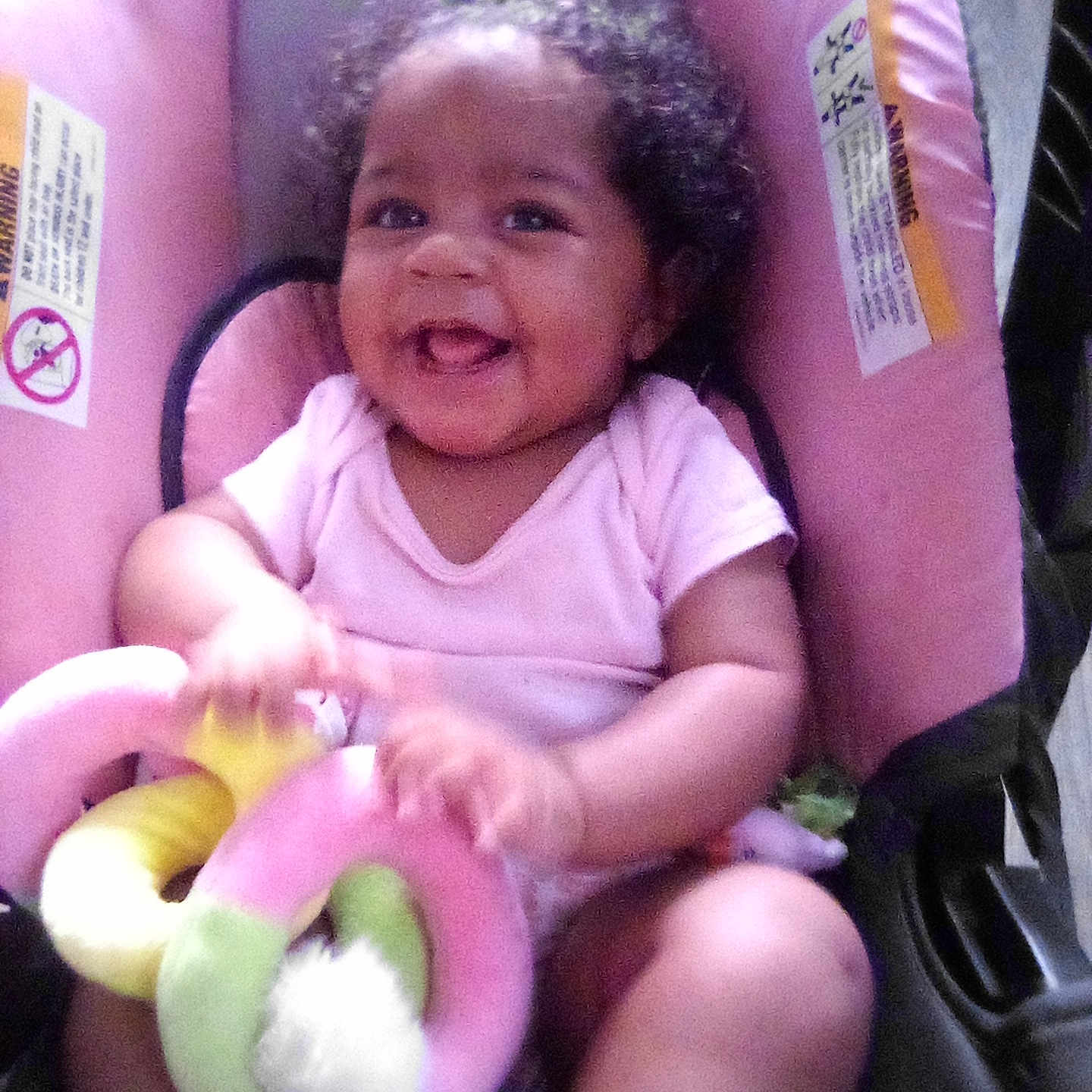 Naila joined the competition — help win amazing prizes! baby, bodypart, chair, clothing, cushion, face, furniture, happy, head, homedecor, laughing, mouth, person, photography, portrait, purple, shorts, smile, t_shirt, toy