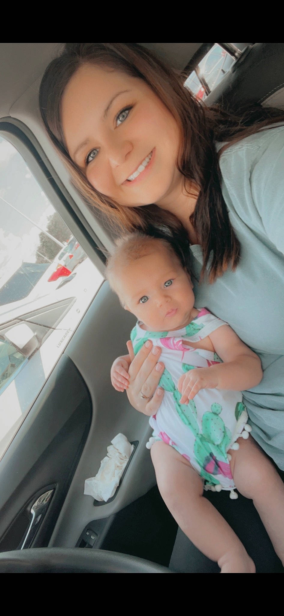 Brooklyn is registered to the contest to win money with this photo: automotive_design, automotive_exterior, baby, child, facial_expression, family_car, finger, fun, gesture, happy, joy, motor_vehicle, person, skin, smile, snapshot, thumb, toddler, travel, vehicle_door