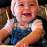 baby, child, infant, smiling, happy, portrait, face, pink_bow, headband, overalls, denim, shirt, sitting, high_chair, table, indoor, home, furniture, dining_area, photography