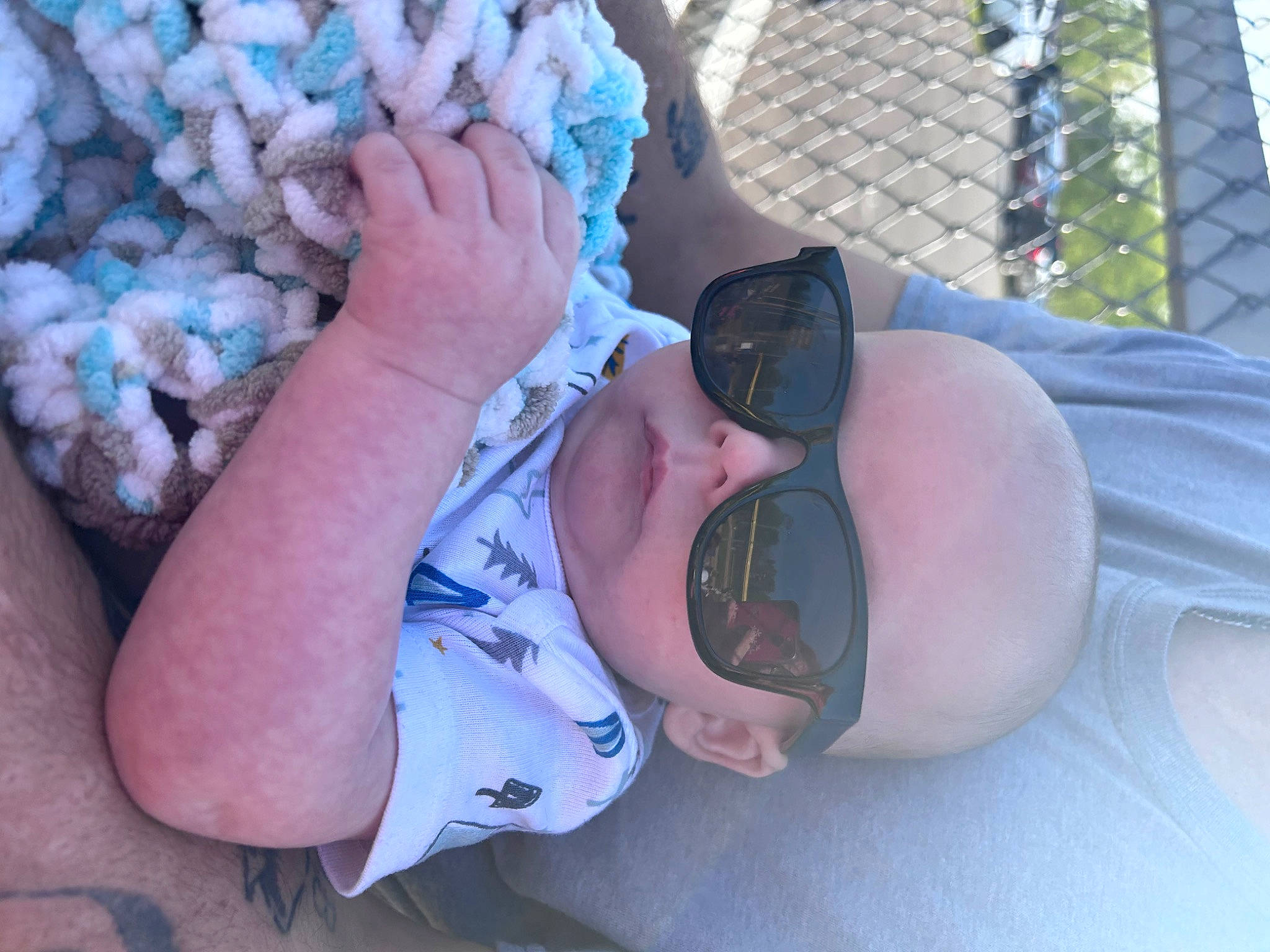 Anakin joined the competition — help win amazing prizes! baby, baby_toddler_clothing, child, electric_blue, eyewear, fence, finger, foot, glasses, goggles, hand, headgear, mesh, nail, person, pink, sunglasses, thumb, toddler, vision_care