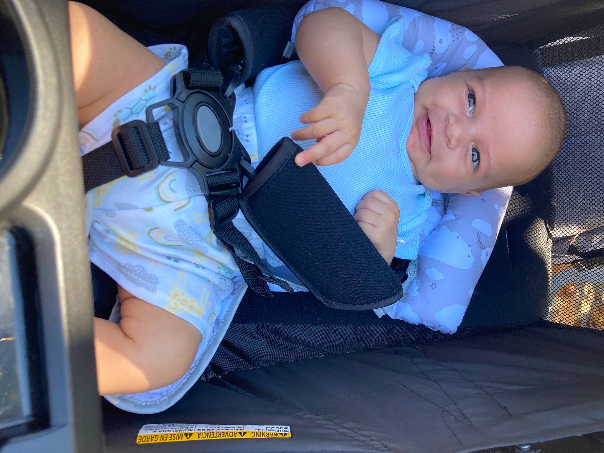 Nathan joined the competition — help win amazing prizes! auto_part, automotive_design, baby, baby_carriage, baby_in_car_seat, baby_toddler_clothing, car_seat, car_seat_cover, comfort, electric_blue, finger, fun, head_restraint, human_leg, joy, knee, lap, leg, person, steering_wheel