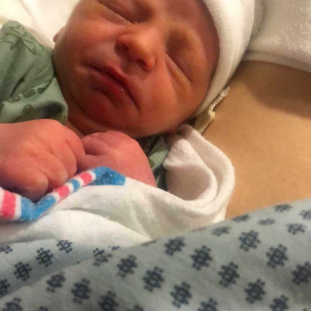 Ghairden is registered to the contest to win money with this photo: architecture, baby, bed, blanket, building, clothing, cushion, face, furniture, glove, head, homedecor, hospital, newborn, person, photography, portrait, quilt, sleeping, towel