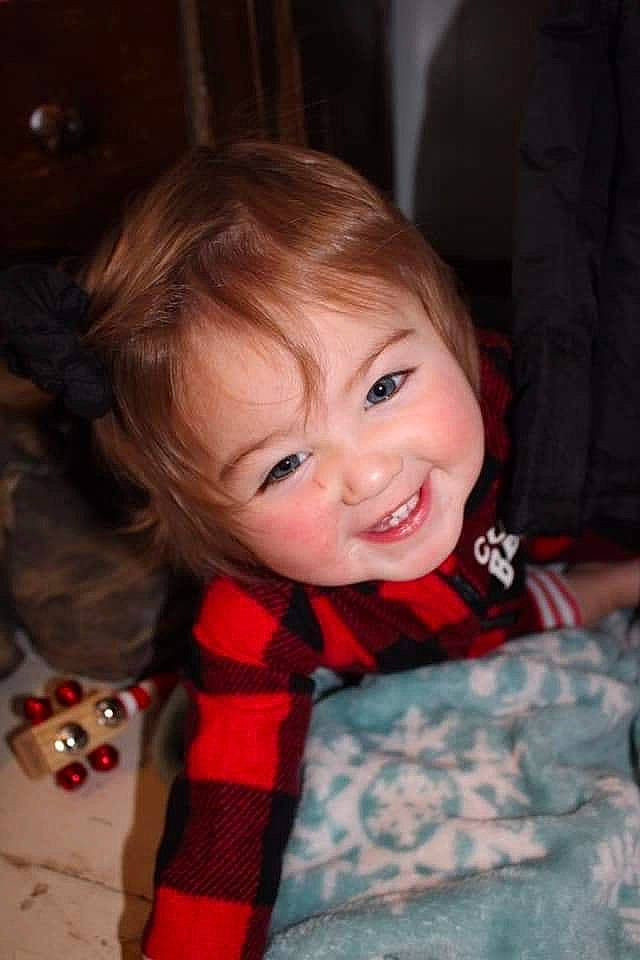 Ashleigh is registered to the contest to win money with this photo: baby, brown_hair, cheek, child, christmas, eye, face, fun, head, iris, joy, lip, nose, pattern, person, plaid, skin, smile, toddler