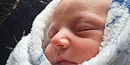 Andie joined the competition — help win amazing prizes! baby, newborn, sleeping, blanket, soft_texture, wrapped, face, closeup, peaceful, infant, cozy, indoor, portrait, child, cute, resting, cushion, warm, skin, head