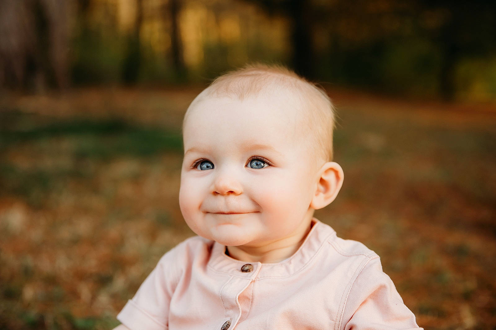 Addison is registered to the contest to win money with this photo: baby, baby_toddler_clothing, cheek, child, flash_photography, fun, grass, happy, iris, joy, laugh, nose, people_in_nature, person, plant, portrait_photography, sitting, sleeve, smile, toddler