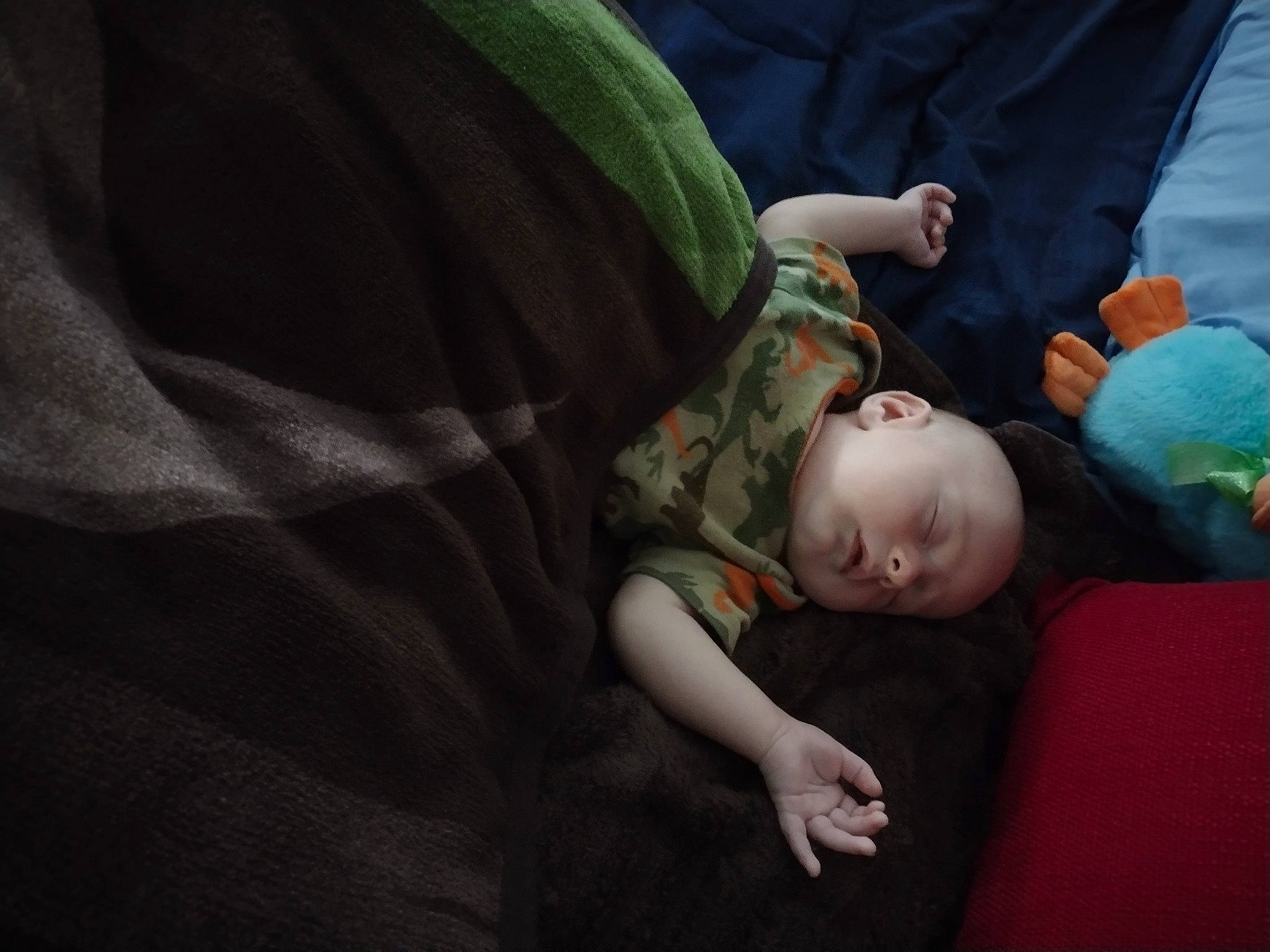 Tyson joined the competition — help win amazing prizes! baby, baby_products, bedtime, child, comfort, darkness, fun, gesture, grass, grey, human_body, linens, nap, person, room, sitting, sleeve, tints_and_shades, toddler, tree