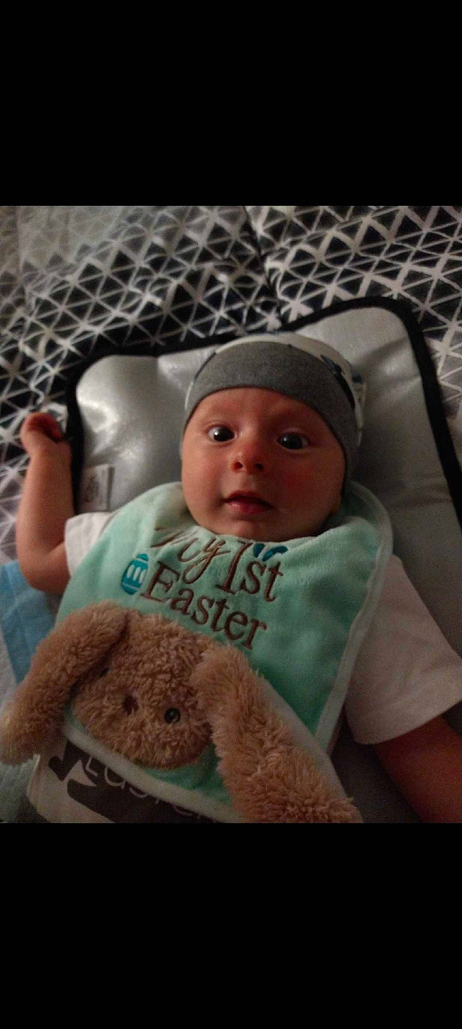 Ty Ty is registered to the contest to win money with this photo: baby, baby_products, baby_safety, baby_sleeping, baby_toddler_clothing, bedding, bedtime, child, comfort, fur, headwear, knit_cap, linens, mammal, nap, person, room, t_shirt, teddy_bear, toddler