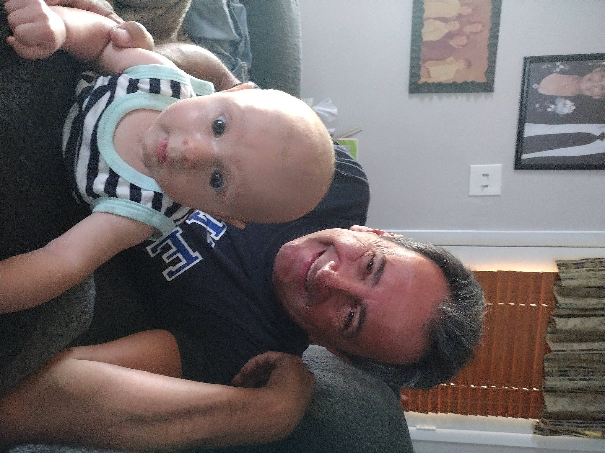 Tyson H is registered to the contest to win money with this photo: abdomen, baby, blurred, cheek, chest, comfort, elbow, event, fun, gesture, happy, joint, joy, mouth, muscle, person, picture_frame, shoulder, sleeve, smile