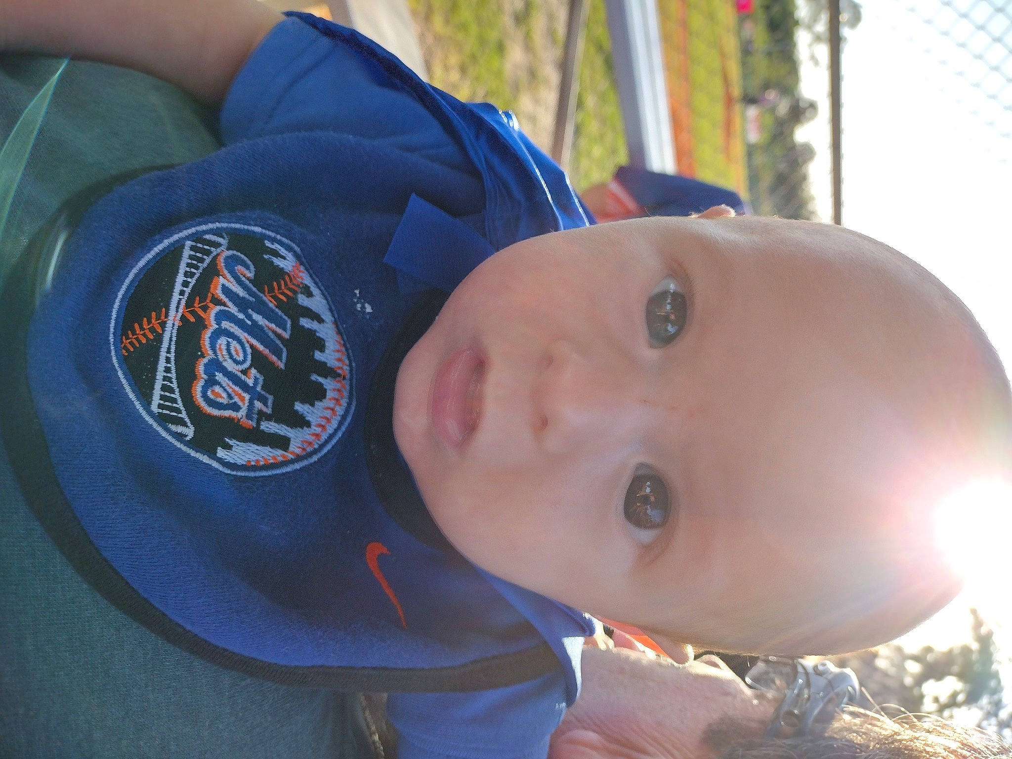 Tyson joined the competition — help win amazing prizes! baby, baby_toddler_clothing, baseball_cap, cap, child, elbow, electric_blue, fun, grass, hat, headgear, leisure, person, plant, recreation, sleeve, smile, sun_hat, toddler, tree