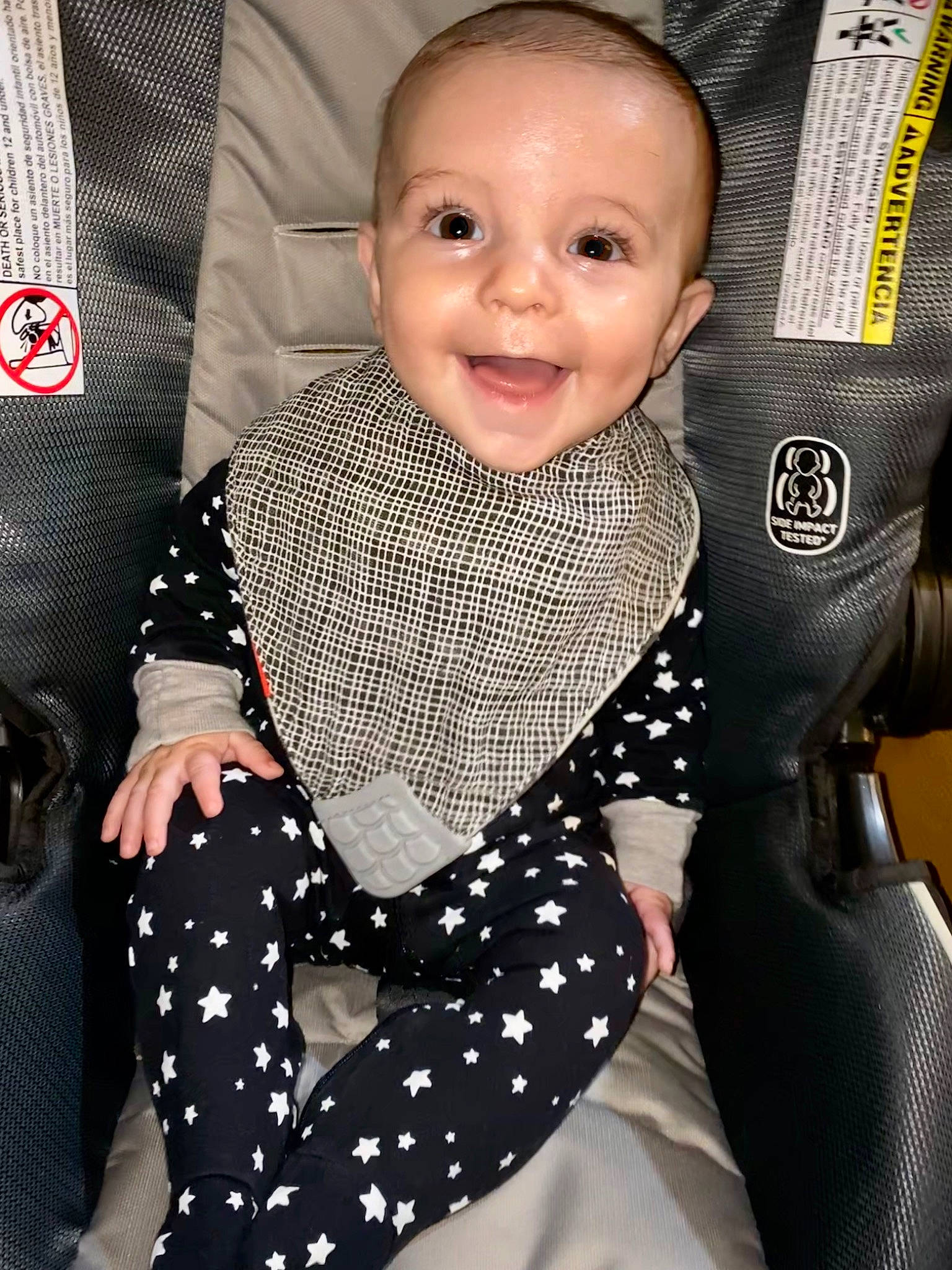 Montgomery is registered to the contest to win money with this photo: arm, baby, baby_toddler_clothing, beauty, black, child, comfort, design, dress, flooring, happy, joy, outerwear, pattern, person, product, sitting, sleeve, smile, thigh