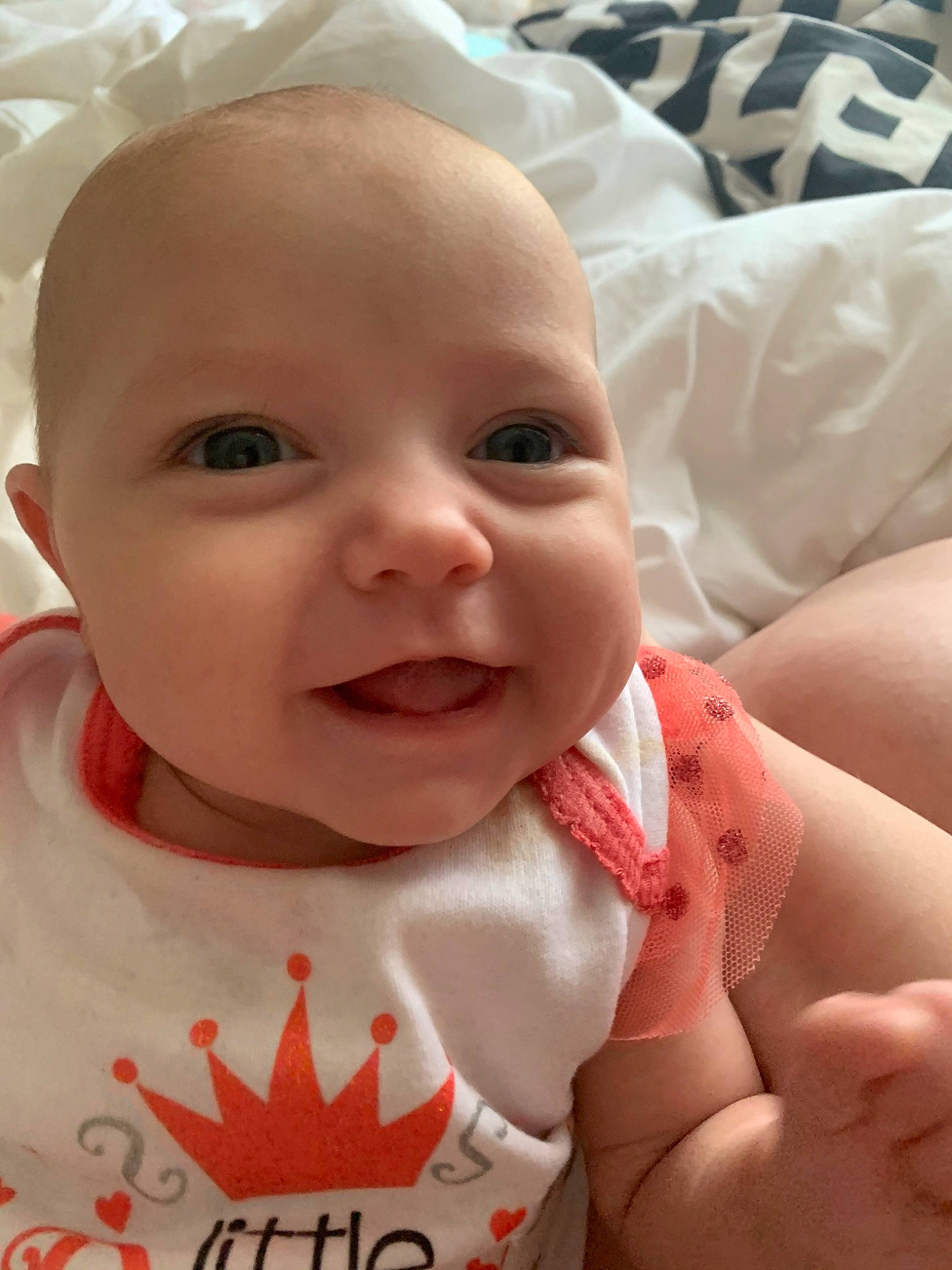 Mia Rose is registered to the contest to win money with this photo: baby, baby_making_funny_faces, cheek, child, chin, eye, face, facial_expression, finger, head, lip, mouth, nose, person, skin, smile, thumb, toddler