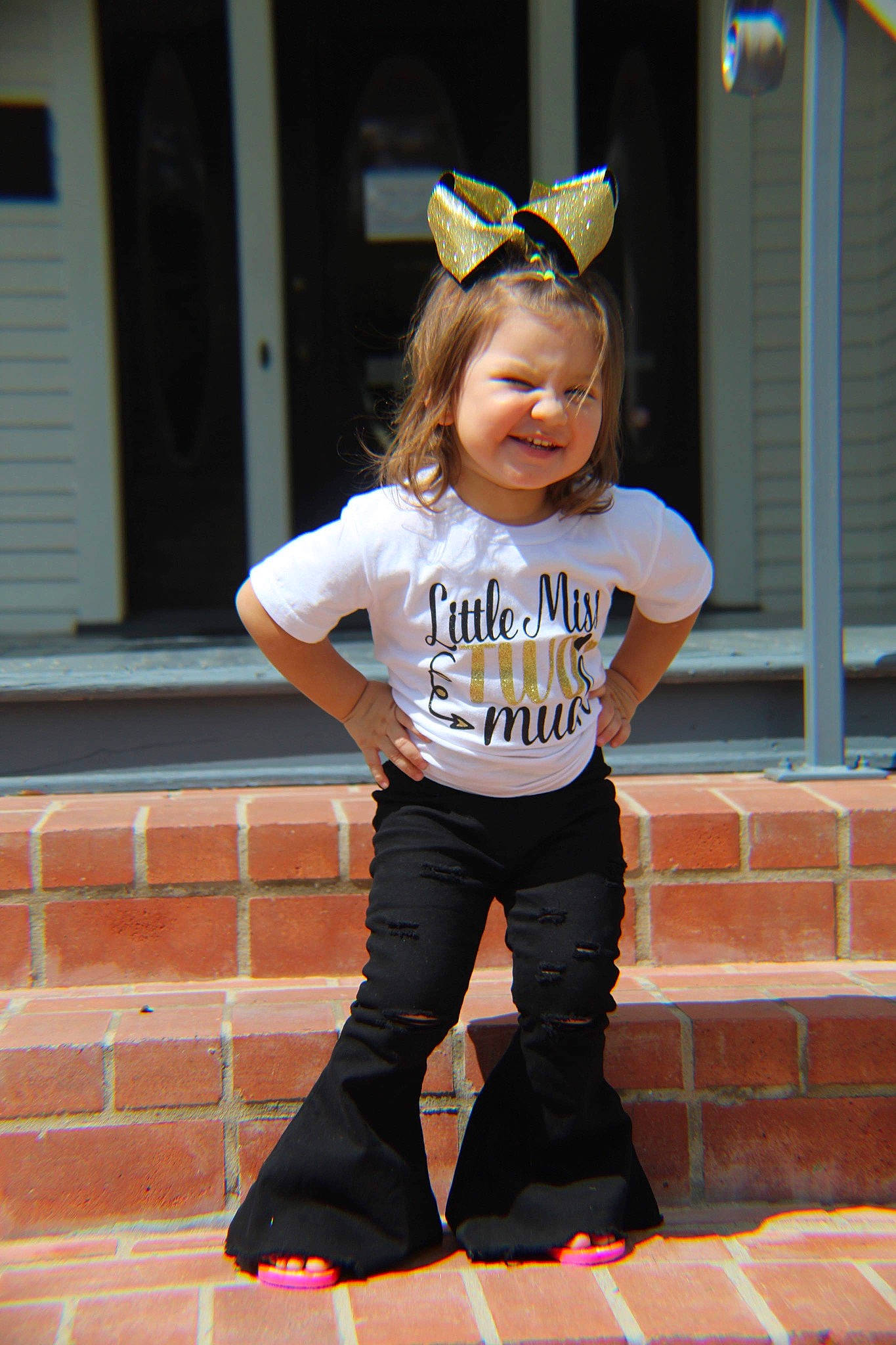 Jaiileigh joined the competition — help win amazing prizes! baby_toddler_clothing, brick, brickwork, child, electric_blue, eyewear, fashion_accessory, fun, happy, headband, headpiece, joy, mammal, person, personal_protective_equipment, pink, sleeve, smile, sportswear, t_shirt