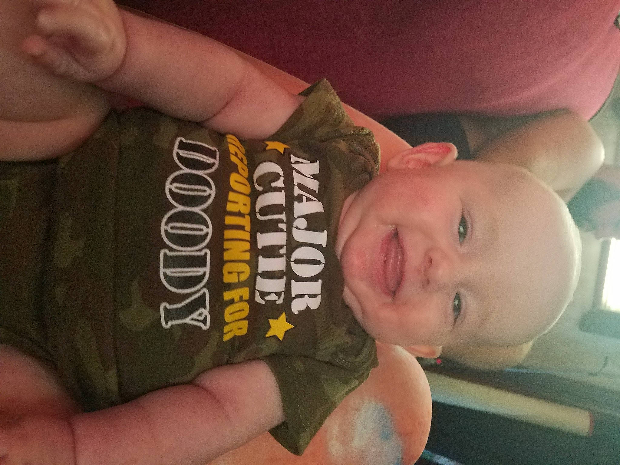 Gavin is registered to the contest to win money with this photo: baby, child, drink, finger, hand, muscle, person, thumb, toddler