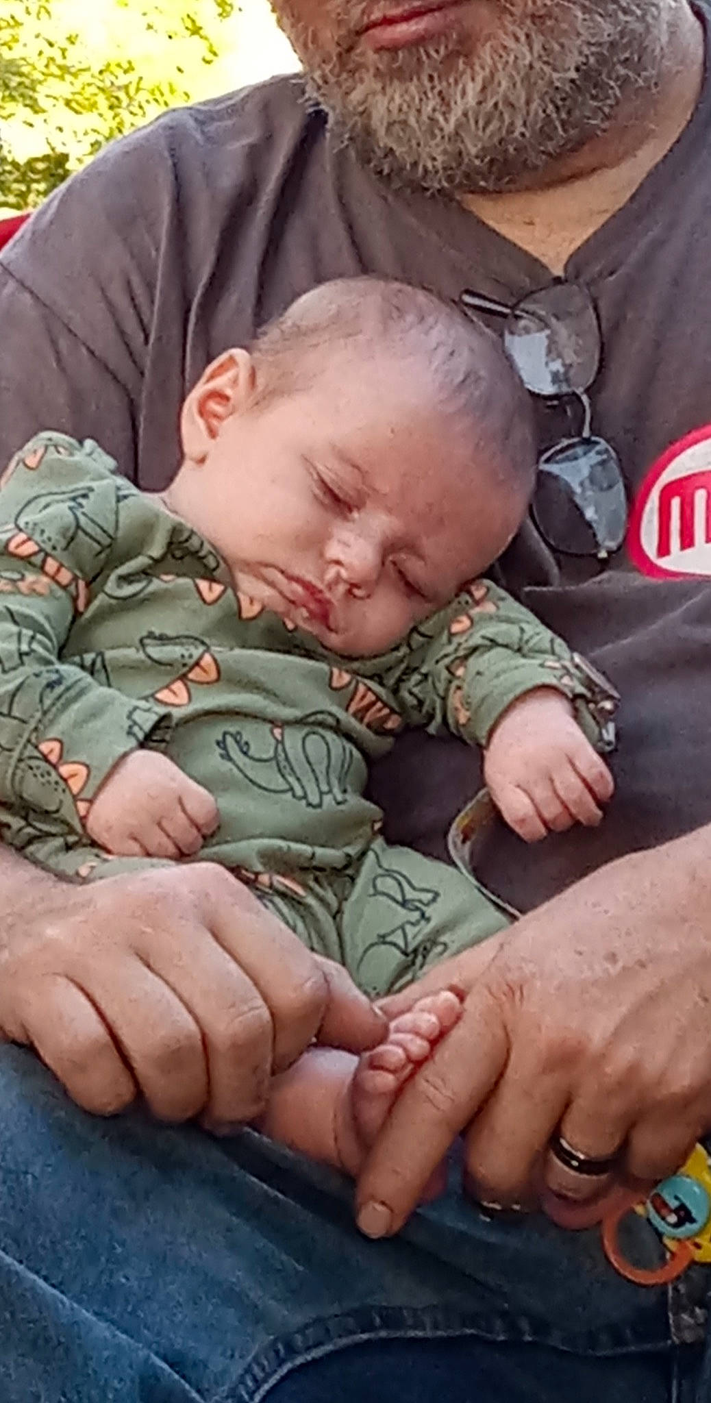 Ledger joined the competition — help win amazing prizes! baby, baby_toddler_clothing, barefoot, camouflage, cheek, child, comfort, finger, gesture, grass, hand, head, military_camouflage, nail, pattern, person, sitting, skin, sleeve, thumb