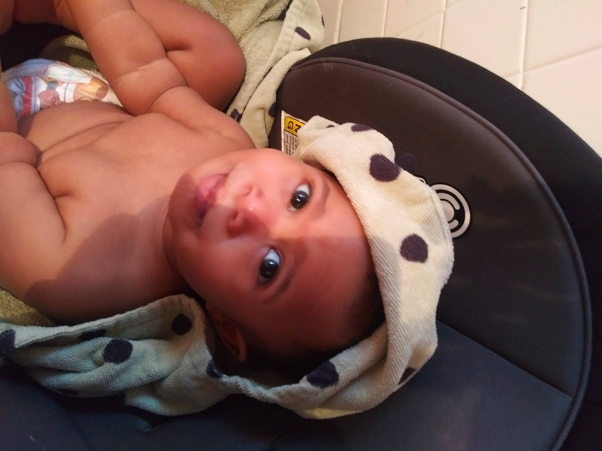 Levi is registered to the contest to win money with this photo: abdomen, arm, baby, baby_products, baby_safety, cheek, chest, child, comfort, eyebrow, eyelash, fun, head, human_body, linens, mouth, neck, nose, person, toddler