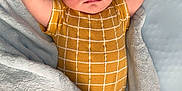 Kal-El joined the competition — help win amazing prizes! baby, sleeping, arms_up, blanket, yellow_clothing, onesie, soft_texture, infant, peaceful, cozy, bed, resting, child, cute, newborn, portrait, indoor, sleepwear, relaxing, toddler