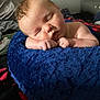 Axel is registered to the contest to win money with this photo: baby, infant, sleeping, blue_blanket, blanket, bed, hand, skin, face, cheek, pillow, cozy, newborn, bedroom, dresser, bedding, portrait, cute, peaceful, resting
