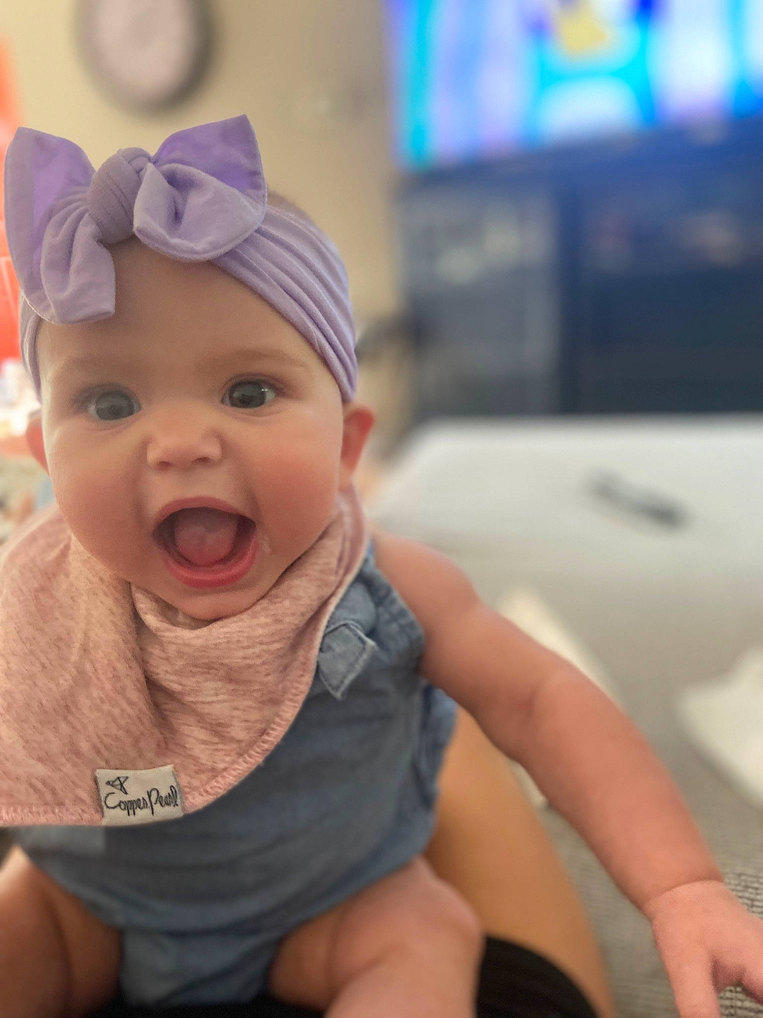 Lennon is registered to the contest to win money with this photo: baby, baby_laughing, baby_products, baby_toddler_clothing, cap, cheek, child, fashion_accessory, fun, happy, headgear, headwear, human_body, laugh, leisure, person, room, sitting, skin, smile