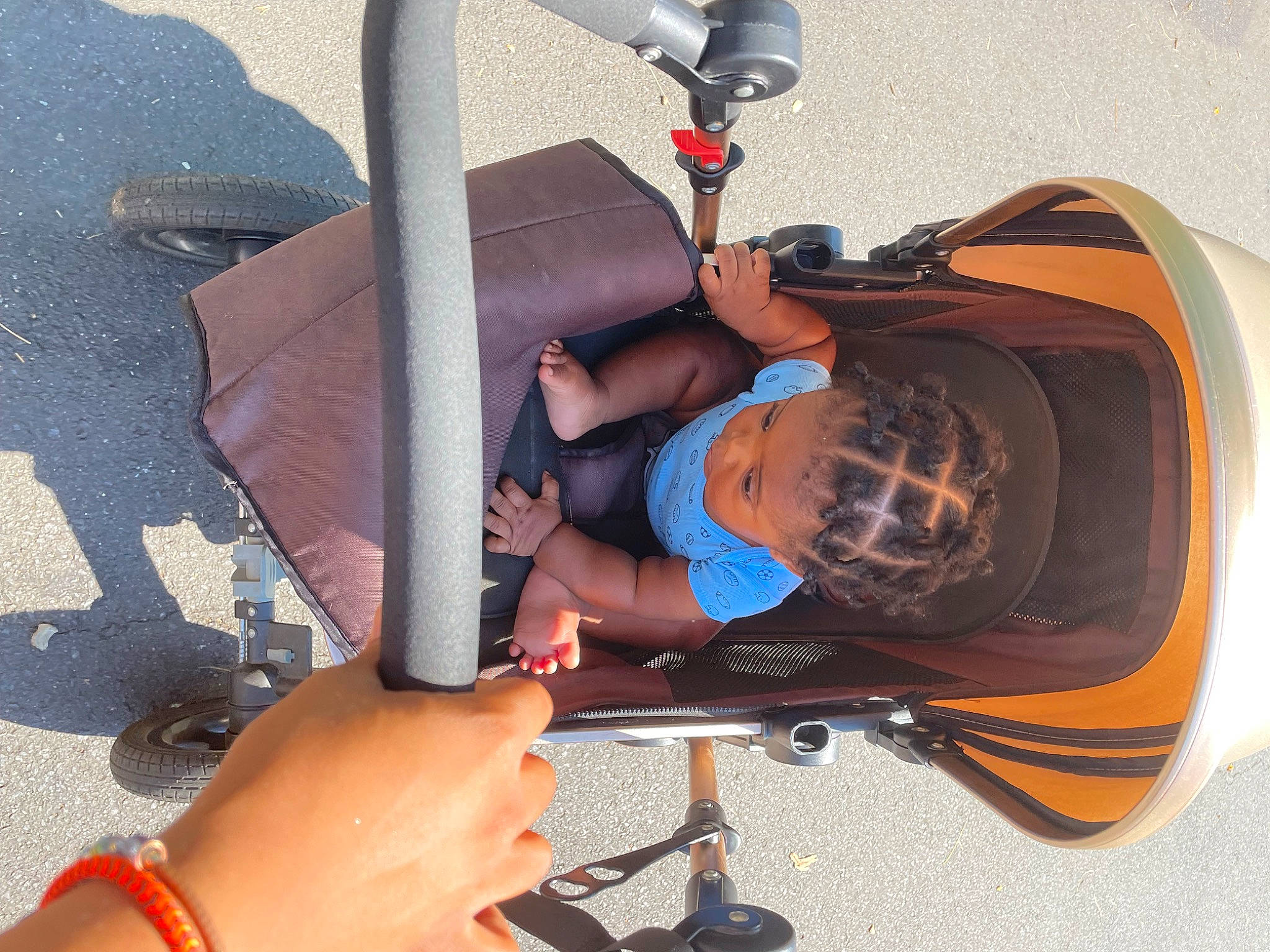 Jaylon is registered to the contest to win money with this photo: auto_part, automotive_design, automotive_exterior, automotive_tire, bumper, fender, finger, hand, helmet, human_leg, knee, machine, motor_vehicle, person, product, rim, thigh, tire, vehicle, wheel